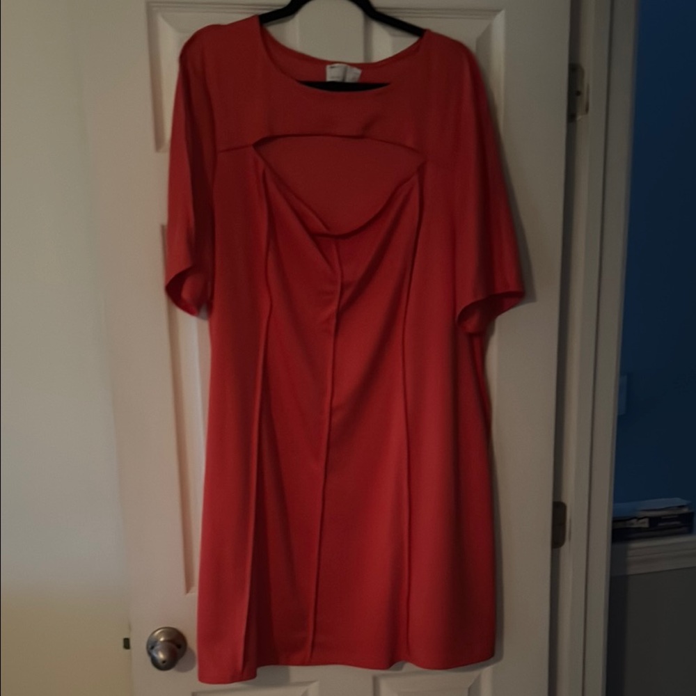 Bright orange mini dress with chest cut out